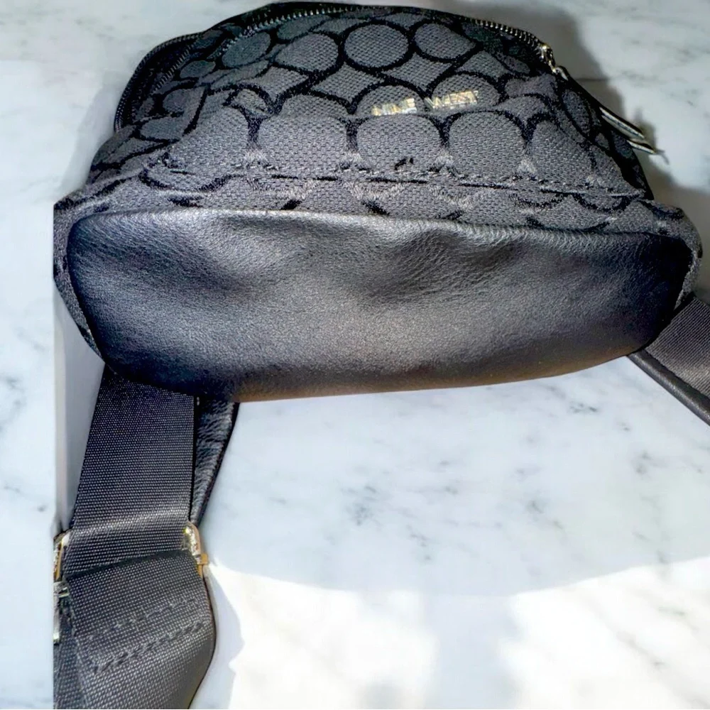 Chic & Compact: Nine West Taren Mini backpack Black logo canvas & leather